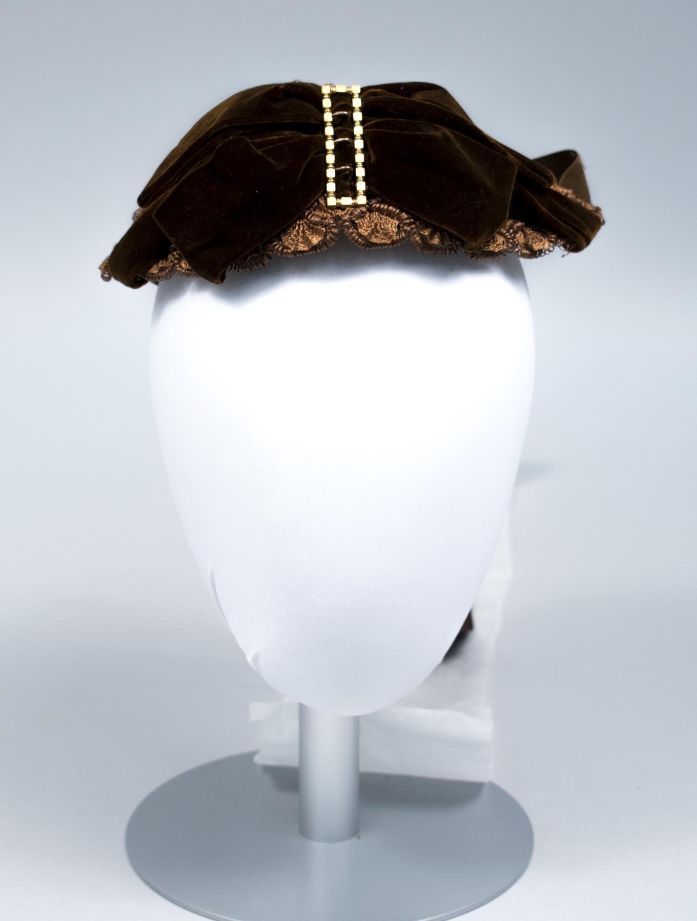 Image of Brown straw hat with brown velvet bow, 1892